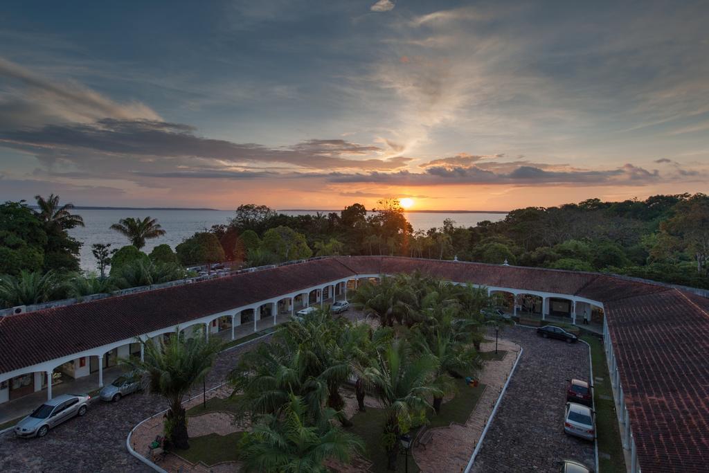 Hotel Tropical מנאוס מראה חיצוני תמונה Sunset at the resort